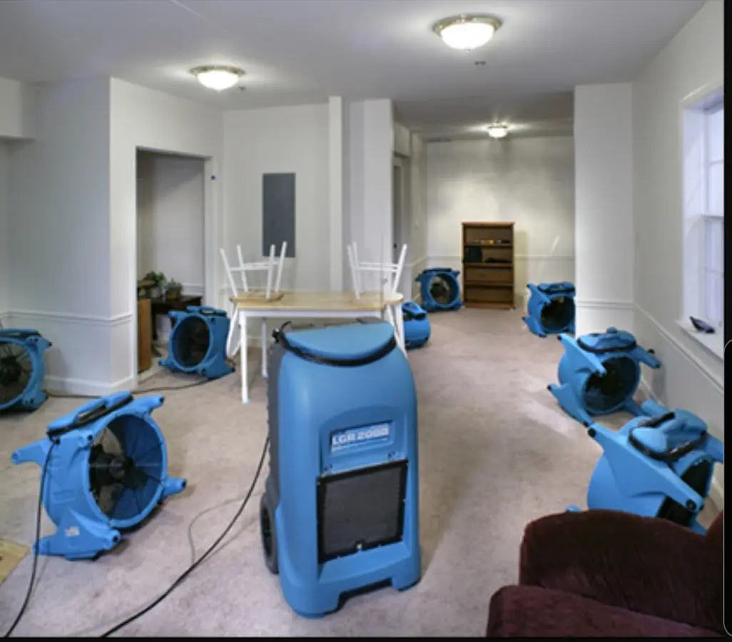 Air movers and dehumidifier setup for Water Damage Restoration in Salida